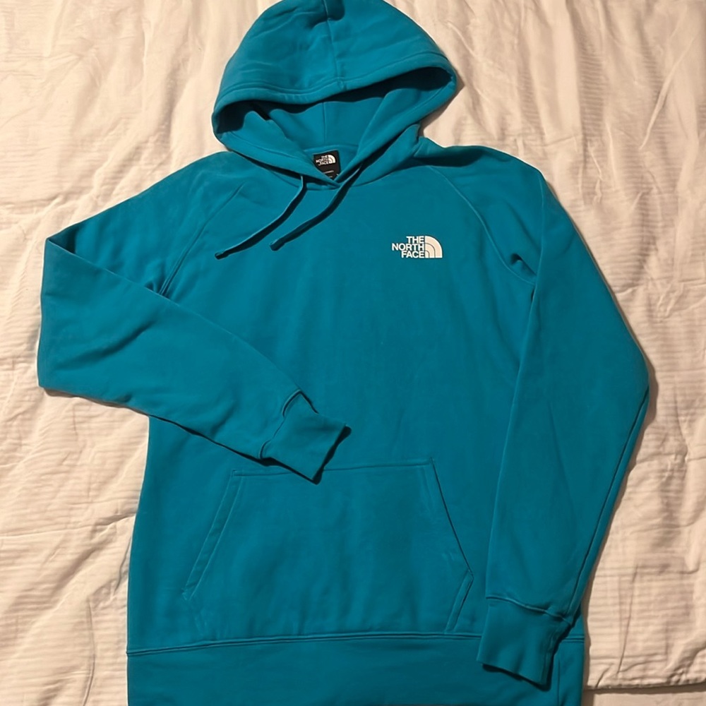 The North Face fleece hoodie for woman. Size M. Color blue.